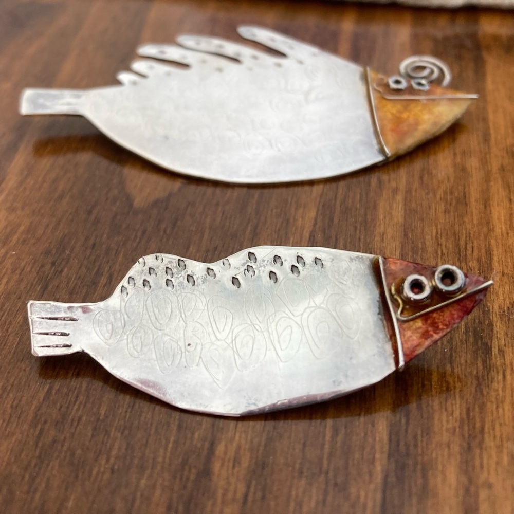 Whimsical pair of fish pins